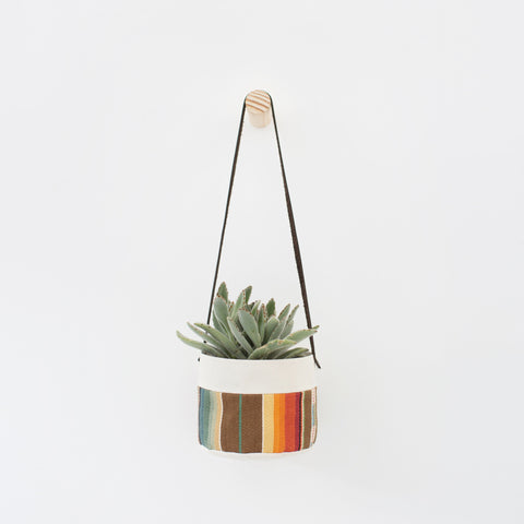 hanging canvas planter with natural wood wall peg hook